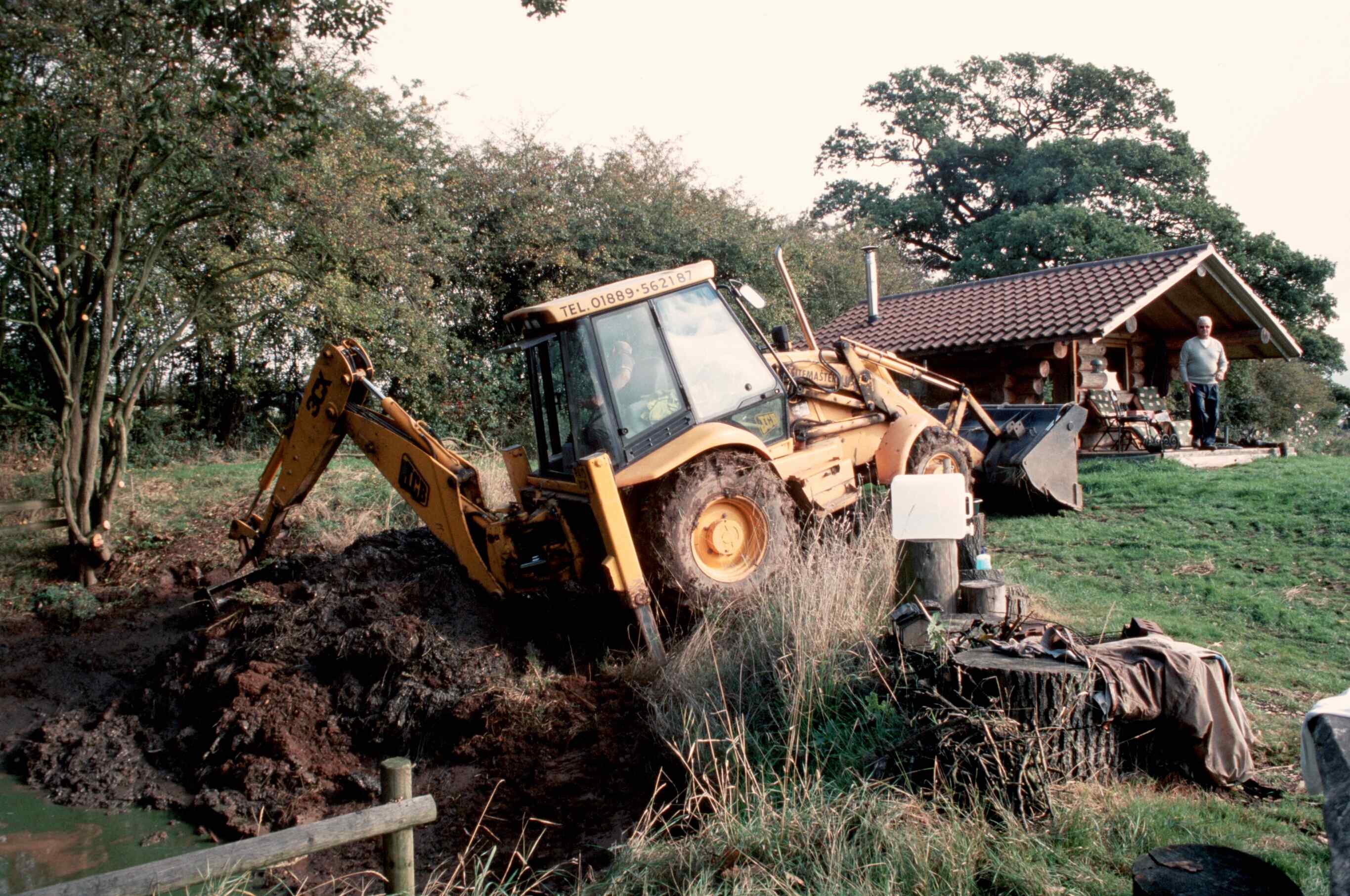 Digging a pond using a JCB digger